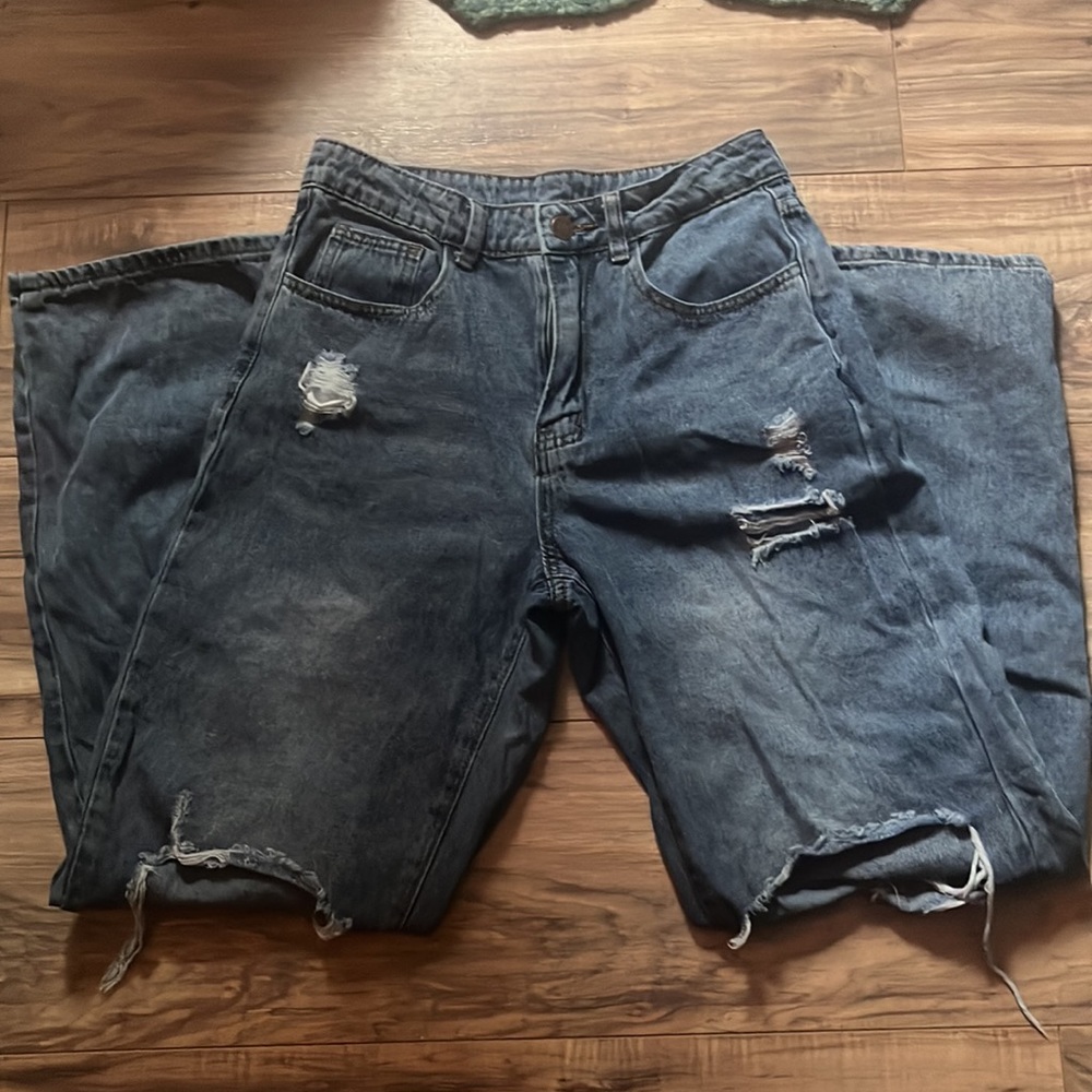 ripped light blue baggy jeans
